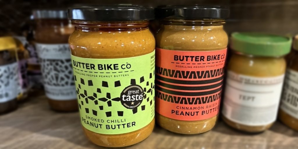 Two jars of Butter Bike Co peanut butter.