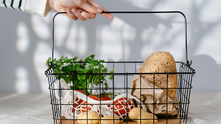 Grocery basket with food.